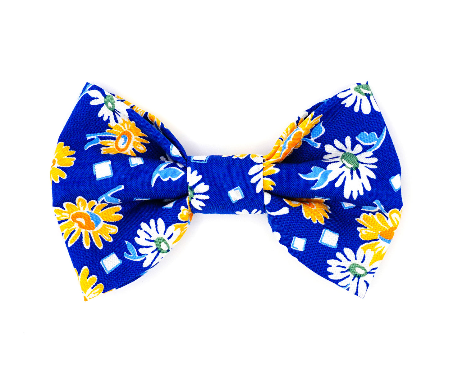Handmade cotton bow tie for dogs (or other pets). Elastic straps on back with snaps make it easy to add to collar, harness, or leash. Bright blue background with yellow, white, green and light blue flowers and shapes.