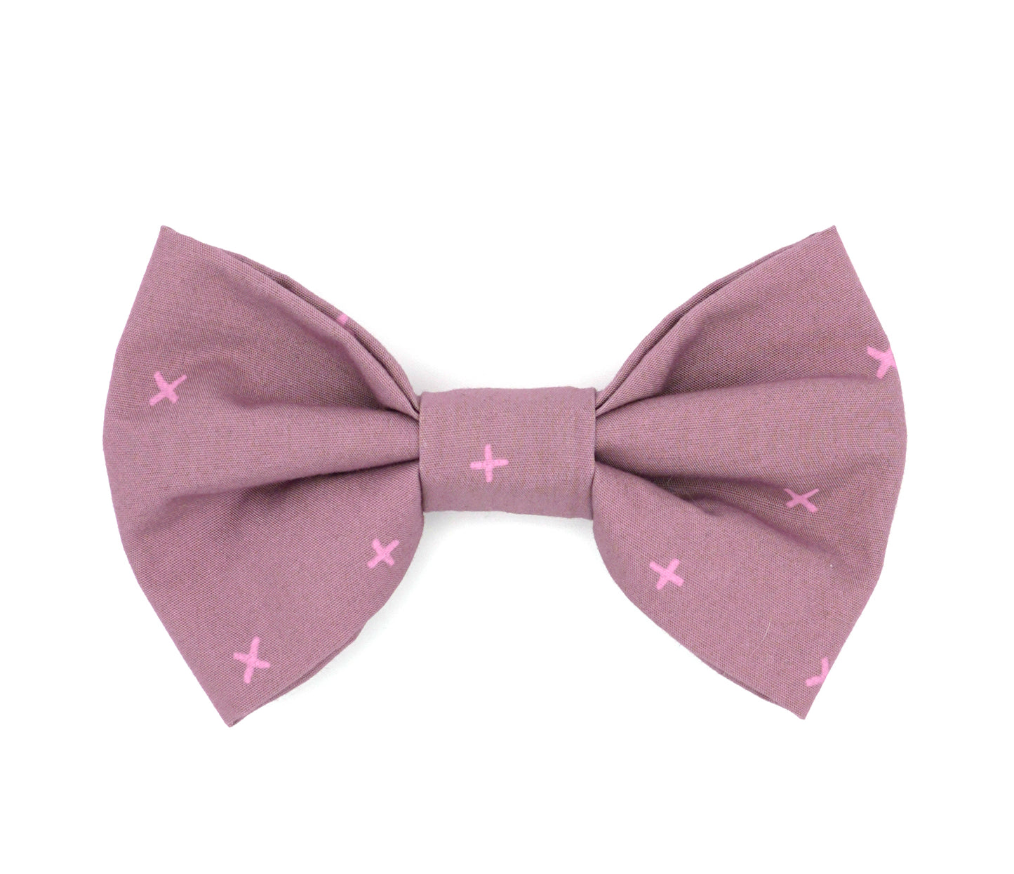 Handmade cotton bow tie for dogs (or other pets). Elastic straps on back with snaps make it easy to add to collar, harness, or leash. Lilac background with purple/pink Xs.