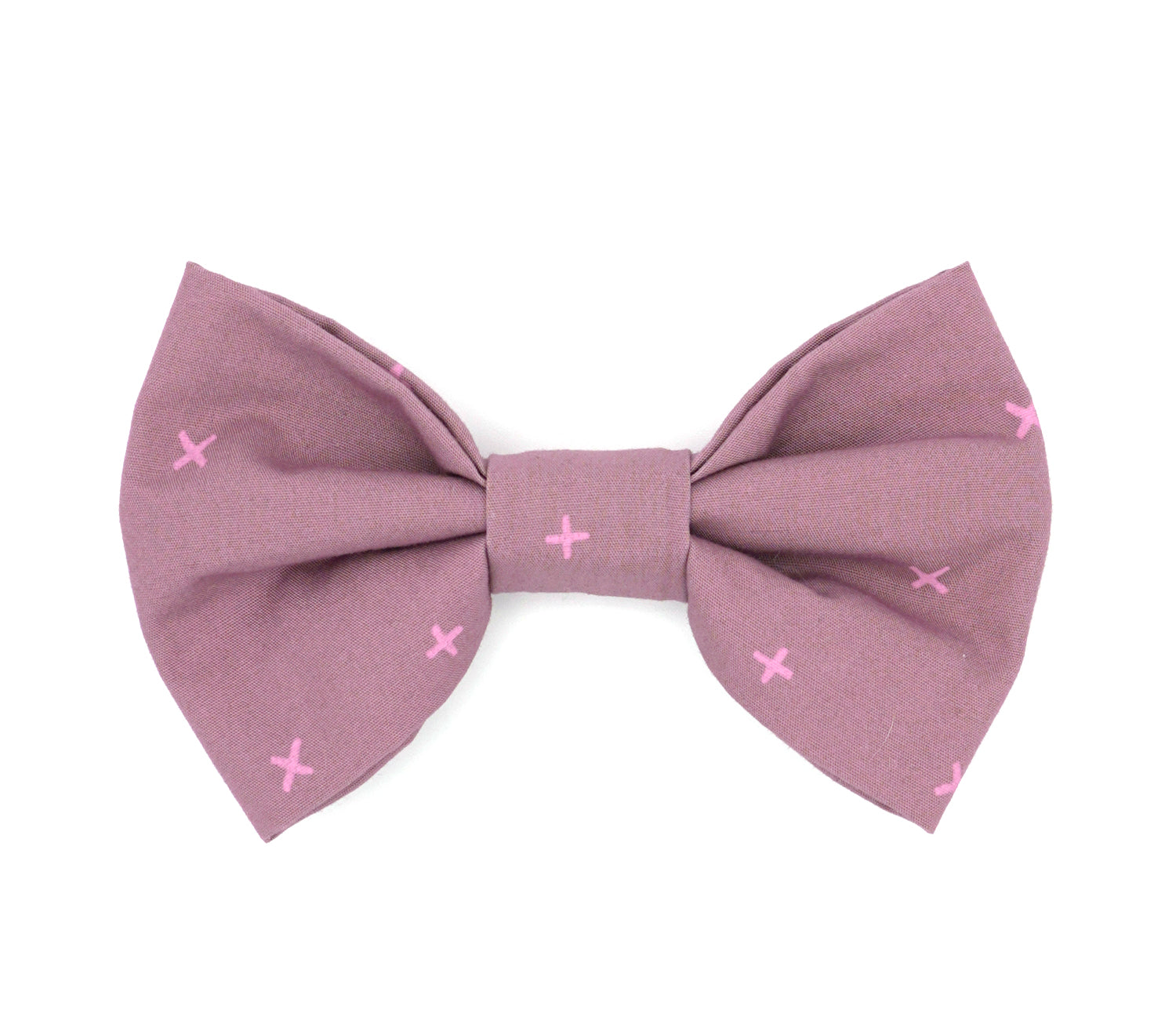 Handmade cotton bow tie for dogs (or other pets). Elastic straps on back with snaps make it easy to add to collar, harness, or leash. Lilac background with purple/pink Xs.