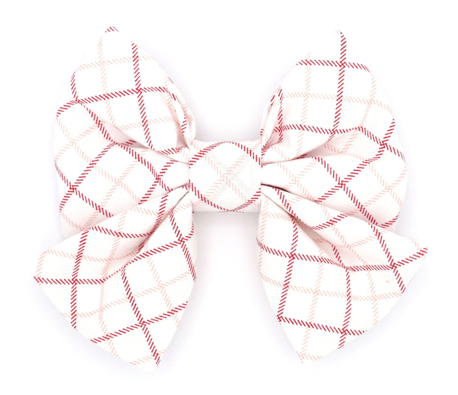 Handmade cotton bow tie with tails for dogs (or other pets). Elastic straps on back with snaps make it easy to add to collar, harness, or leash. White background with red and pink lines.