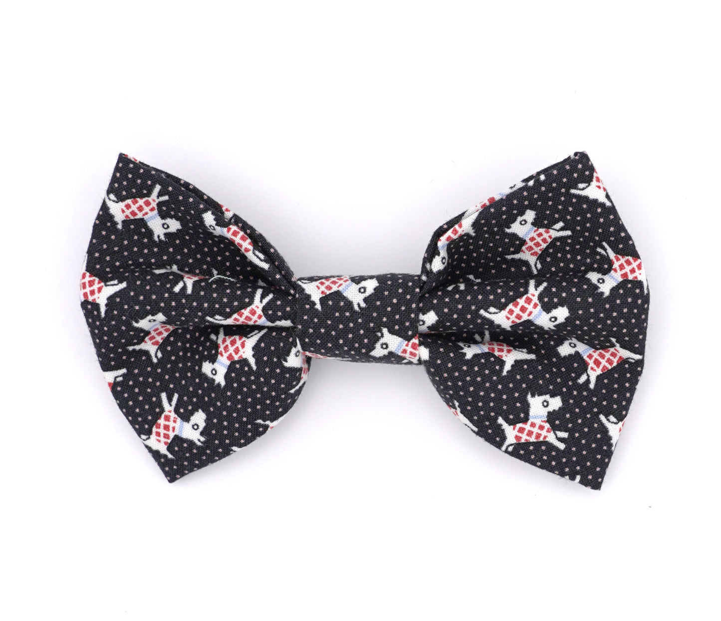 Handmade cotton bow tie for dogs (or other pets). Elastic straps on back with snaps make it easy to add to collar, harness, or leash. Black background with pink polka dots, and white Scottie Dogs wearing red/white checked sweaters,  and blue collars.