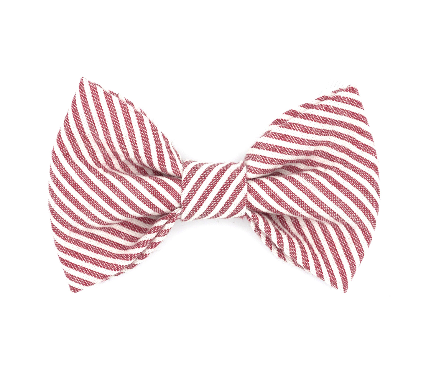Handmade cotton bow tie for dogs (or other pets). Elastic straps on back with snaps make it easy to add to collar, harness, or leash. Red and white stripe seersucker.